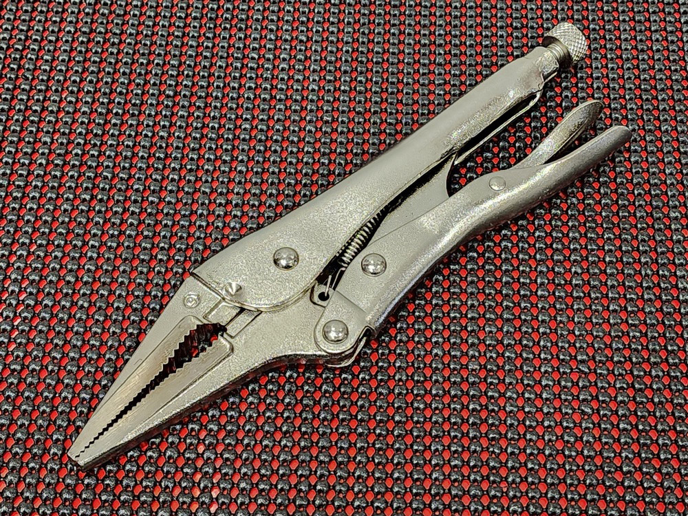 Long nose locking pliers with wire cutter