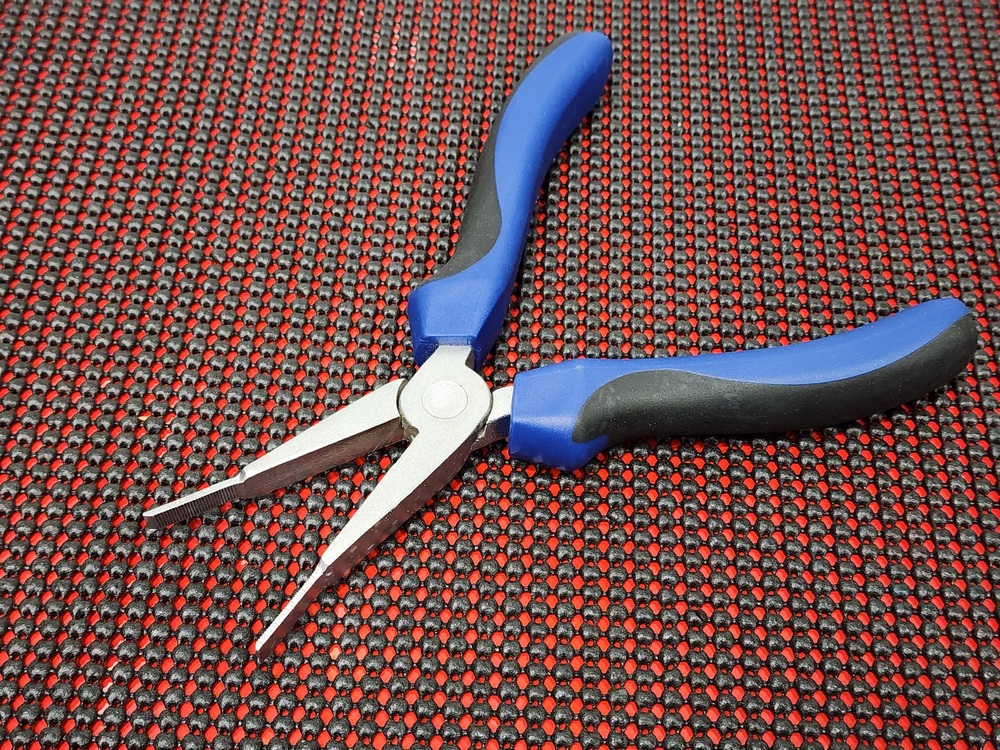 Sun visor unlocking pliers