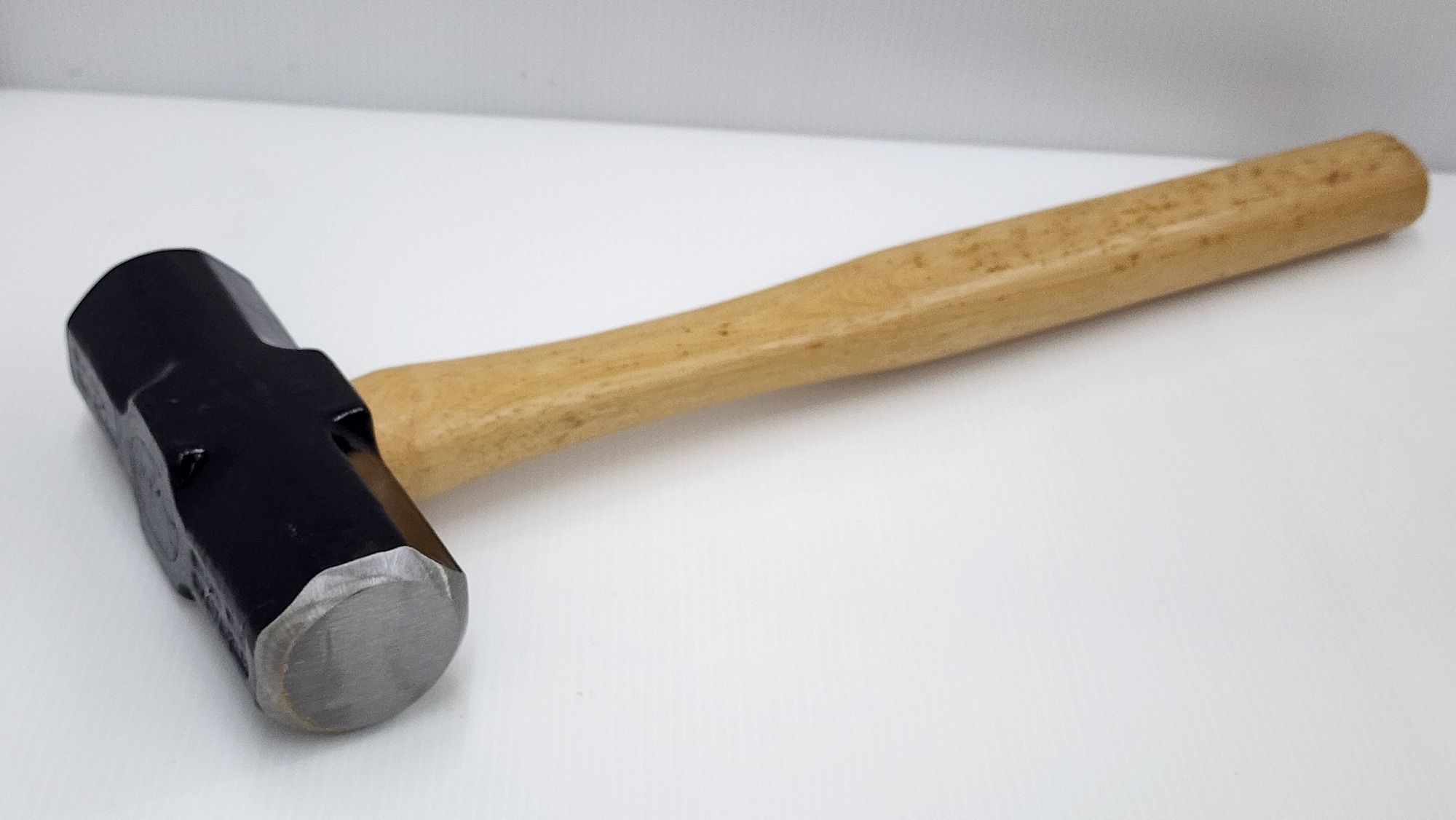 Wooden sledge hammer